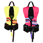 Two colorful life vests with harnesses on a white background